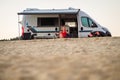 Campervan or motorhome parked on the beach in Greece